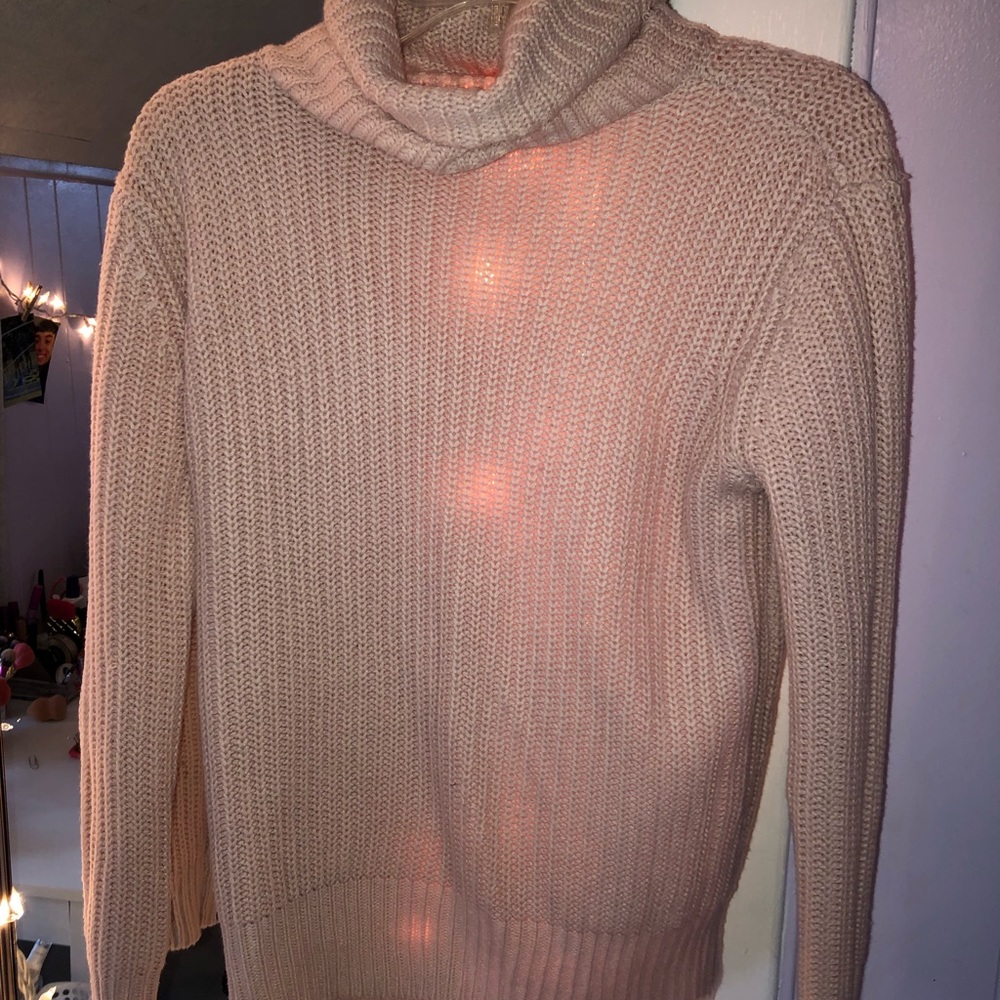 Light pink turtleneck sweater